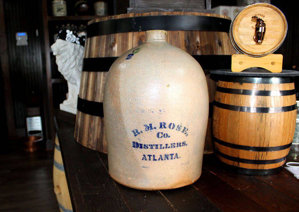 An old whiskey jug with R.M. Rose and Co. written on it